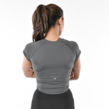 Top a compressione con maniche a cappuccio